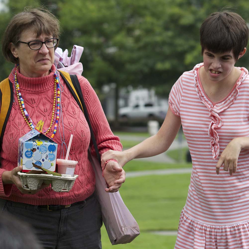 woman with her daughter in a park