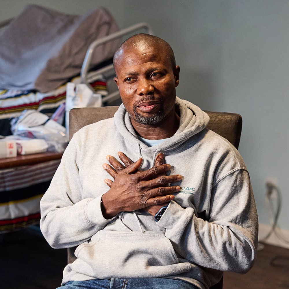 ARC Employee holding his heart