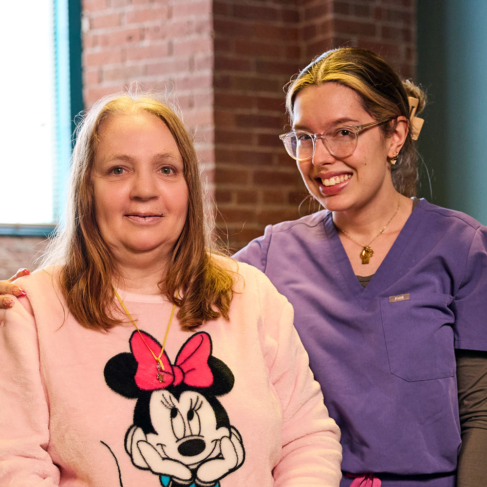 Smiling ARC Employee with ARC client