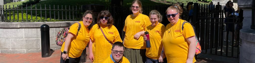 Arc clients smiling on a sunny day