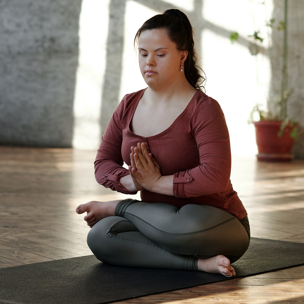 Young woman in a yoga pose